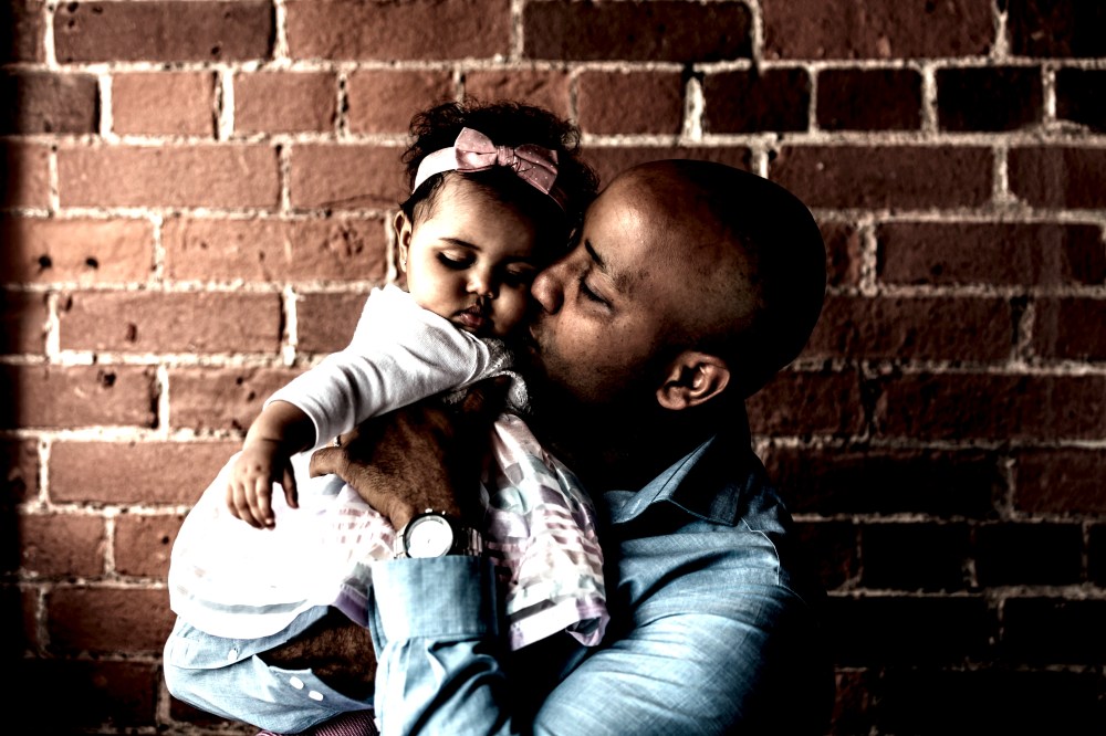 father-gives-baby-daughter-a-kiss